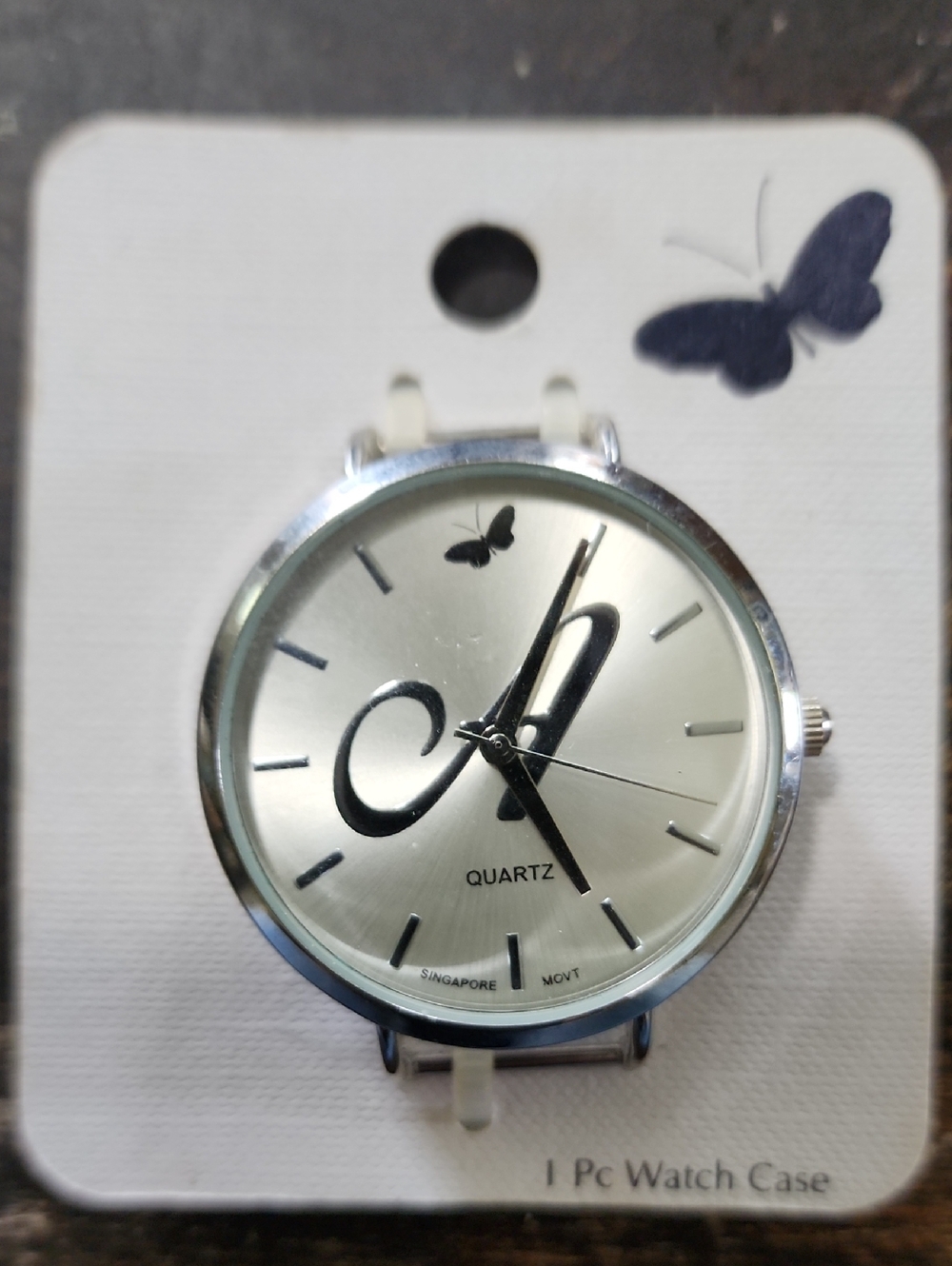 Silver Butterfly Accent Women's Quartz Watch With White Leather Band